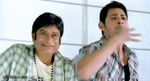 Two Men Are Standing Next To Each Other And One Is Wearing A Shirt That Says ' X ' On It GIF