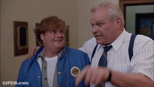 Two Men Are Standing Next To Each Other And One Of Them Has A Patch On His Jacket That Says ' A ' On It . GIF