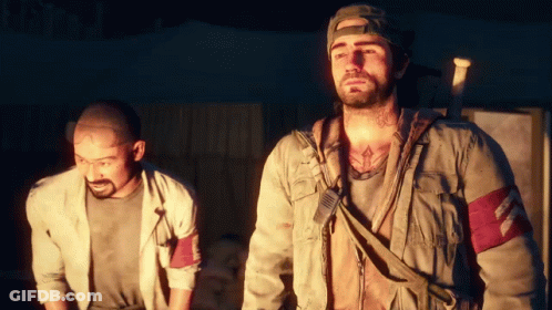 Two Men Are Standing Next To Each Other And One Of Them Has A Tattoo On His Chest GIF