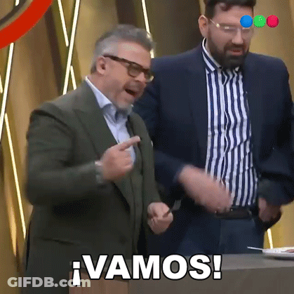 Two Men Are Standing Next To Each Other And One Of Them Is Pointing And The Other Is Saying Vamos ! GIF