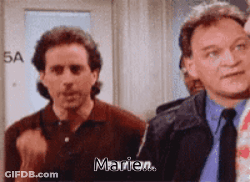 Two Men Are Standing Next To Each Other And One Of Them Is Saying " Marie " GIF