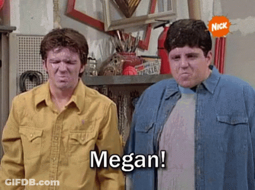 Two Men Are Standing Next To Each Other And One Of Them Is Saying Megan ! GIF