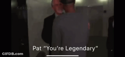 Two Men Are Standing Next To Each Other And One Of Them Is Saying Pat " You 'Re Legendary " GIF
