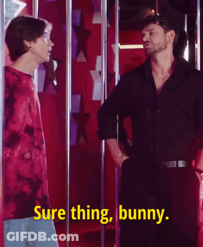 Two Men Are Standing Next To Each Other And One Of Them Is Saying Sure Thing Bunny . GIF