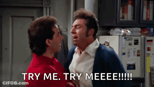 Two Men Are Standing Next To Each Other And One Of Them Is Saying Try Me Try Meeeee GIF