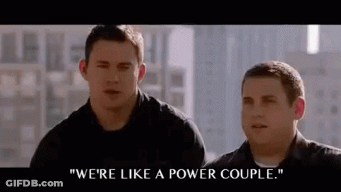 Two Men Are Standing Next To Each Other And One Of Them Is Saying `` We 'Re Like A Power Couple '' . GIF