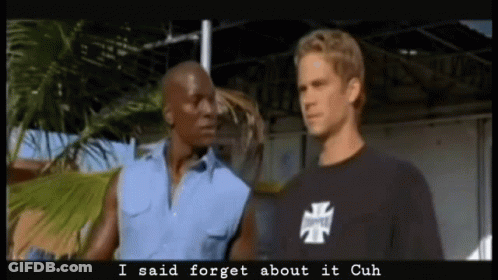 Two Men Are Standing Next To Each Other And One Of Them Is Wearing A Shirt That Says I Said Forget About It Cuh GIF