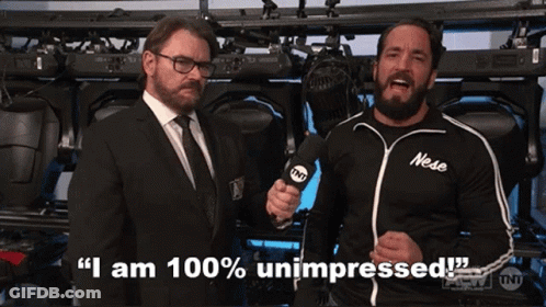 Two Men Are Standing Next To Each Other And One Of Them Is Wearing A Shirt That Says Nese On It GIF