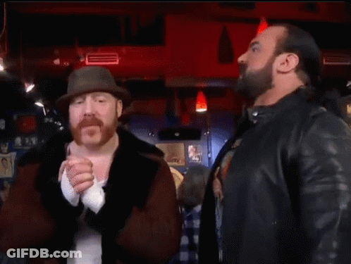 Two Men Are Standing Next To Each Other And The Word Banger Is On The Bottom GIF
