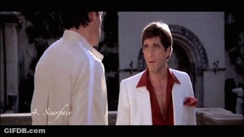Two Men Are Standing Next To Each Other And The Word Scarface Is On The Bottom GIF