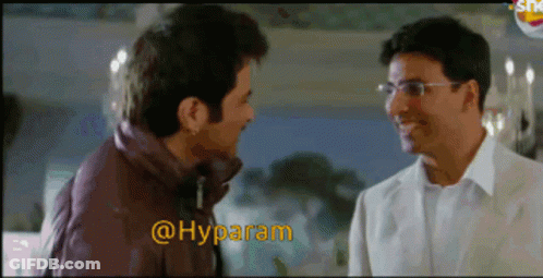 Two Men Are Standing Next To Each Other And The Words @Hyparam Are On The Screen GIF