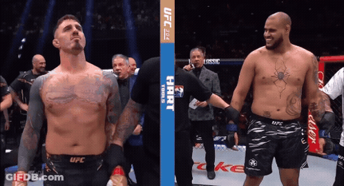 Two Men Are Standing Next To Each Other In A Boxing Ring With A Banner That Says Ufc On It GIF