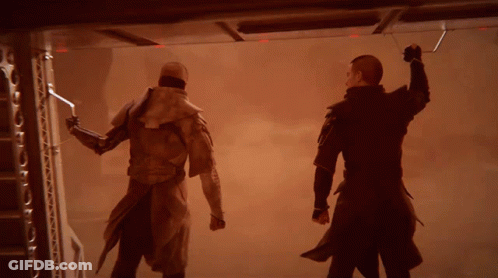 Two Men Are Standing Next To Each Other In A Room GIF