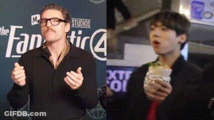 Two Men Are Standing Next To Each Other In Front Of A Sign That Says Studios GIF