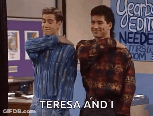 Two Men Are Standing Next To Each Other In Front Of A Sign That Says ' Teresa And I ' On It . GIF