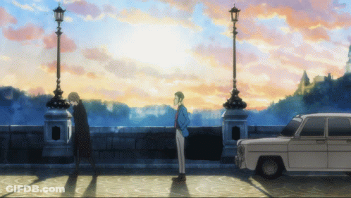 Two Men Are Standing Next To Each Other In Front Of A White Car GIF