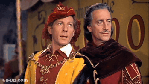 Two Men Are Standing Next To Each Other In Front Of A Yellow Sign That Says 00 GIF