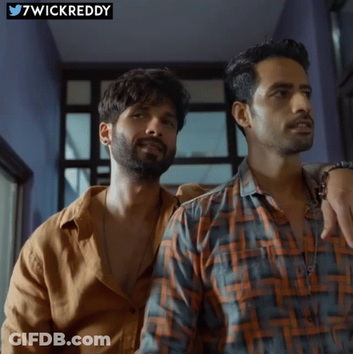 Two Men Are Standing Next To Each Other With A Wickreddy Logo In The Background GIF