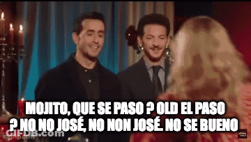 Two Men Are Standing Next To Each Other With A Woman Behind Them And A Caption That Says Mojito GIF