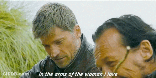 Two Men Are Standing Next To Each Other With One Saying In The Arms Of The Woman I Love GIF