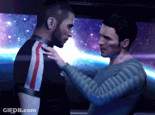 Two Men Are Standing Next To Each Other With One Wearing A Shirt With The Letter N On It GIF