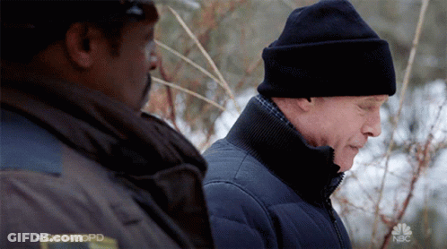 Two Men Are Standing Next To Each Other With The Hashtag #Chicagopd On The Bottom GIF