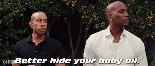 Two Men Are Standing Next To Each Other With The Words Better Hide Your Baby Oil On The Bottom GIF