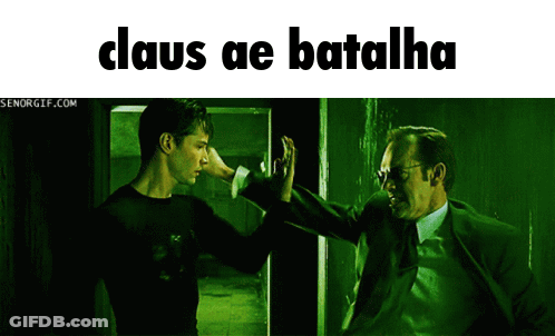 Two Men Are Standing Next To Each Other With The Words Claus Ae Batalha Written Above Them GIF