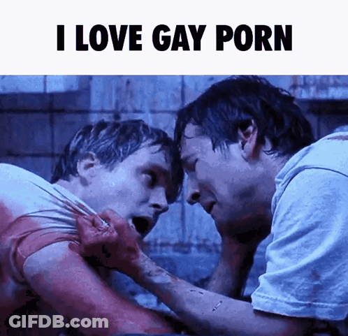 Two Men Are Standing Next To Each Other With The Words I Love Gay Porn Below Them GIF