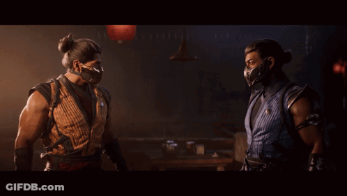 Two Men Are Standing On A Balcony Looking At A Sunset GIF