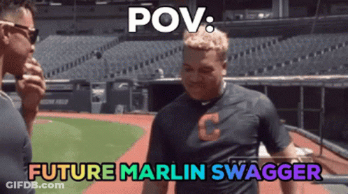 Two Men Are Standing On A Baseball Field With The Words Pov Future Marlin Swagger GIF