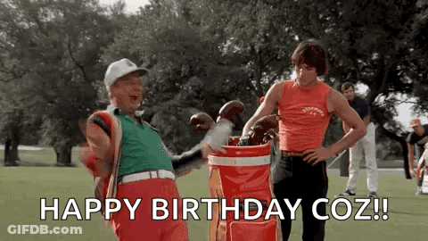 Two Men Are Standing On A Golf Course And One Of Them Is Holding A Golf Bag . GIF