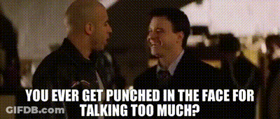 Two Men Are Talking To Each Other And One Of Them Says `` You Ever Get Punched In The Face For Talking Too Much '' GIF