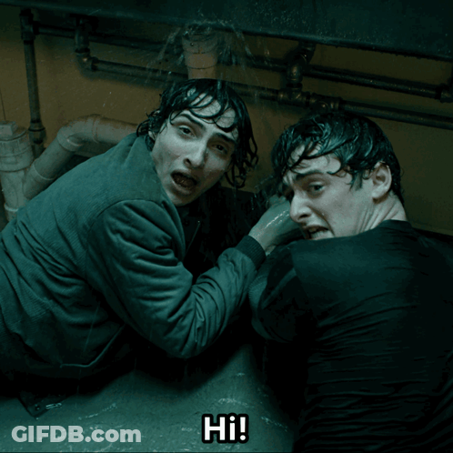 Two Men Are Under A Sink And One Of Them Is Screaming Hi GIF