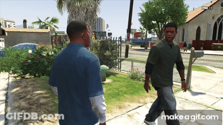 Two Men Are Walking Down A Sidewalk In A Video Game With Make A Gif.com At The Bottom Of The Screen GIF