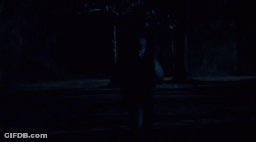 Two Men Are Walking In The Dark And One Has A Hoodie On GIF