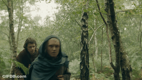 Two Men Are Walking Through A Forest With Hbo Written On The Bottom GIF