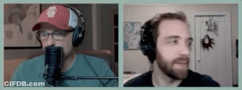 Two Men Are Wearing Headphones And Talking Into Microphones . GIF