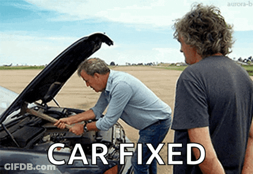 Two Men Are Working On A Car With The Words Car Fixed Written Below Them GIF