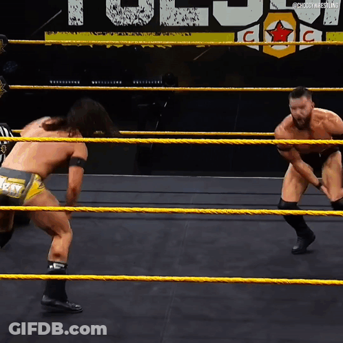 Wrestling Men With Reign Belt GIF