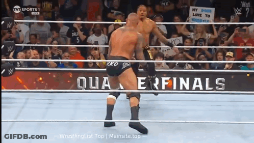 Two Men Are Wrestling In A Ring With A Sign That Says My Soul Love To Brooklyn GIF