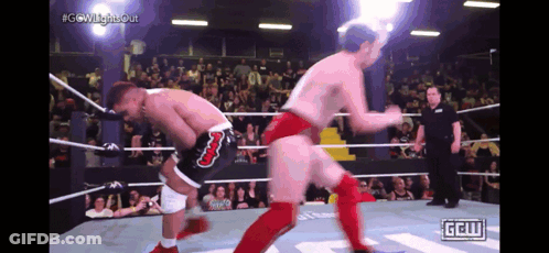 Two Men Are Wrestling In A Ring With Ggw Written On The Bottom Of The Screen GIF