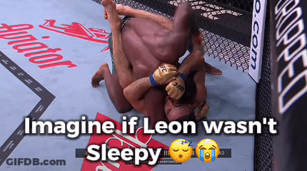 Two Men Are Wrestling In A Ring With The Words Imagine If Leon Wasn 'T Sleepy GIF