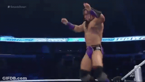 Two Men Are Wrestling In A Ring With The Words Smackdown On The Bottom GIF