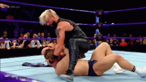 Two Men Are Wrestling In A Wrestling Ring With A Watermark That Says ' Wrestling ' On It GIF