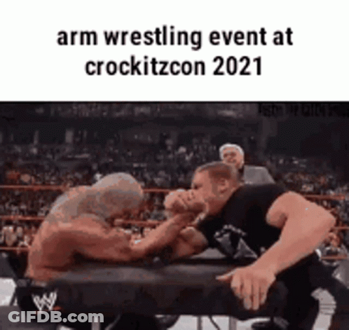 Two Men Arm Wrestling In Ring GIF