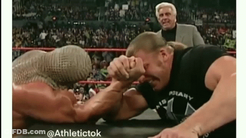 Two Men Arm Wrestling With Referee GIF