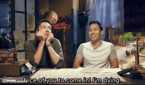 Two Men At Desk With Nice Of You To Come In I'm Dying GIF