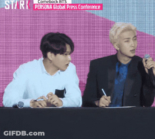 Two Men At Table Comeback BTS Persona Global Press Conference GIF