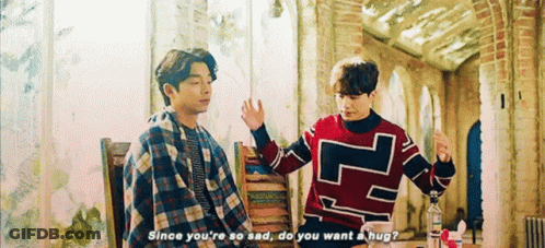 Two Men At Table One Says Since You're So Sad Do You Want A Hug GIF